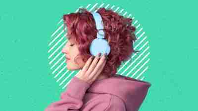 Woman listening to music with headphones. Music Music therapy activities can help people with ADHD find calm, focus, better mood, and emotional regulation.