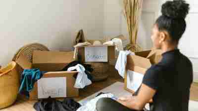 Photo by RDNE Stock project: https://www.pexels.com/photo/a-woman-sitting-in-front-of-cardboard-boxes-8580802/