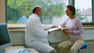 Doctor and patient discuss the overlapping symptoms between ADHD and menopause.