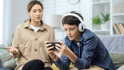 A boy with ADHD interacting with friends only in video games